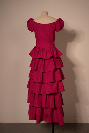 Magenta vintage puff sleeved corsetted ruffled gown